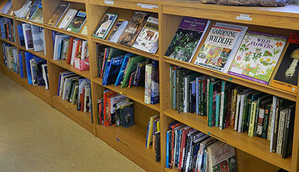 Shelves full of nature books and resources